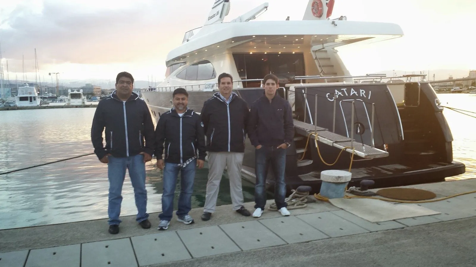 The Otaduy team on the dock alongside Catari, a Canados 86, on delivery day