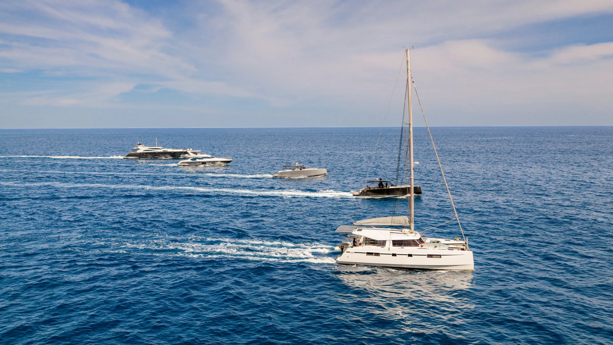 The Otaduy fleet under way on open water off Los Cabos, aerial view