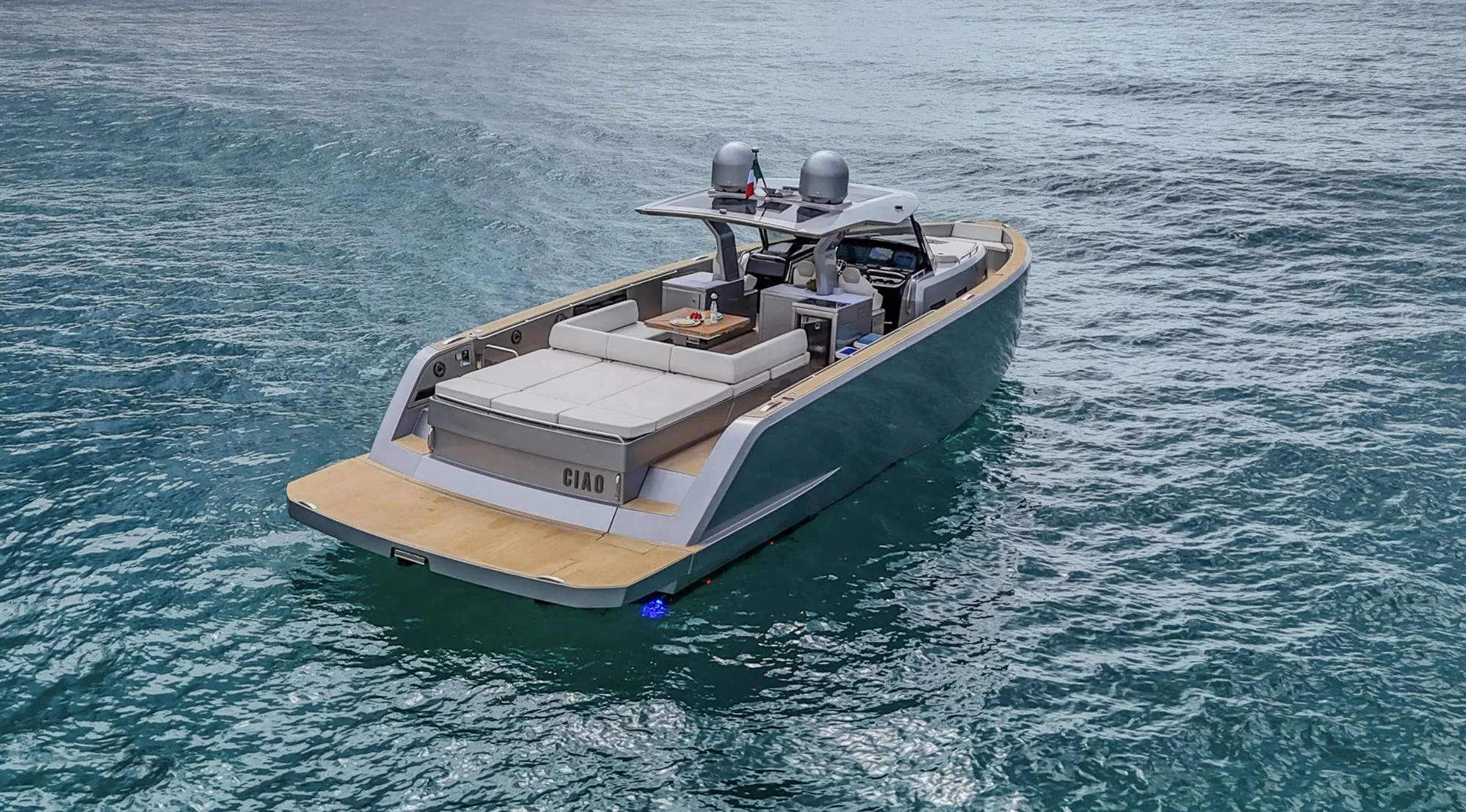 Aerial stern view of CIAO showing swim platform and sun loungers