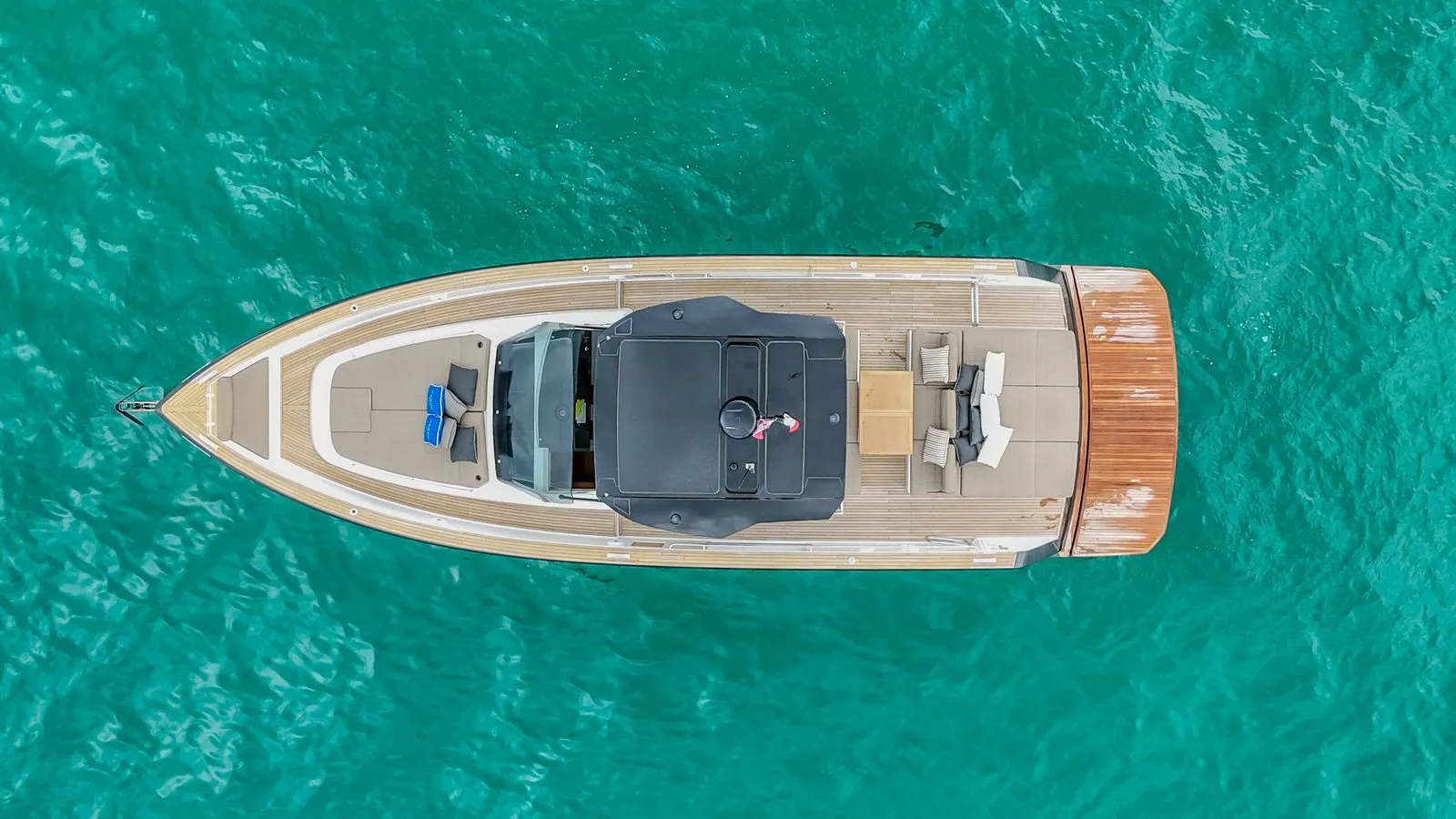 Top down aerial of Bésame showing teak deck and cockpit seating