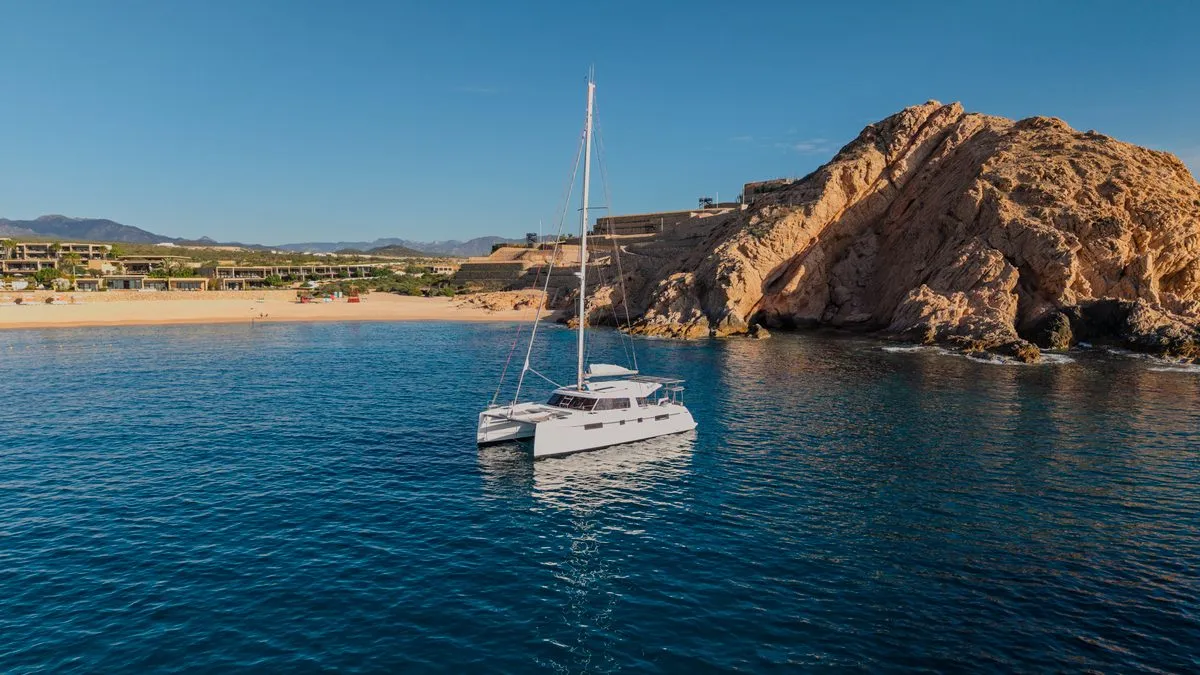 Telemachus anchored beside the rock headland at Santa Maria cove