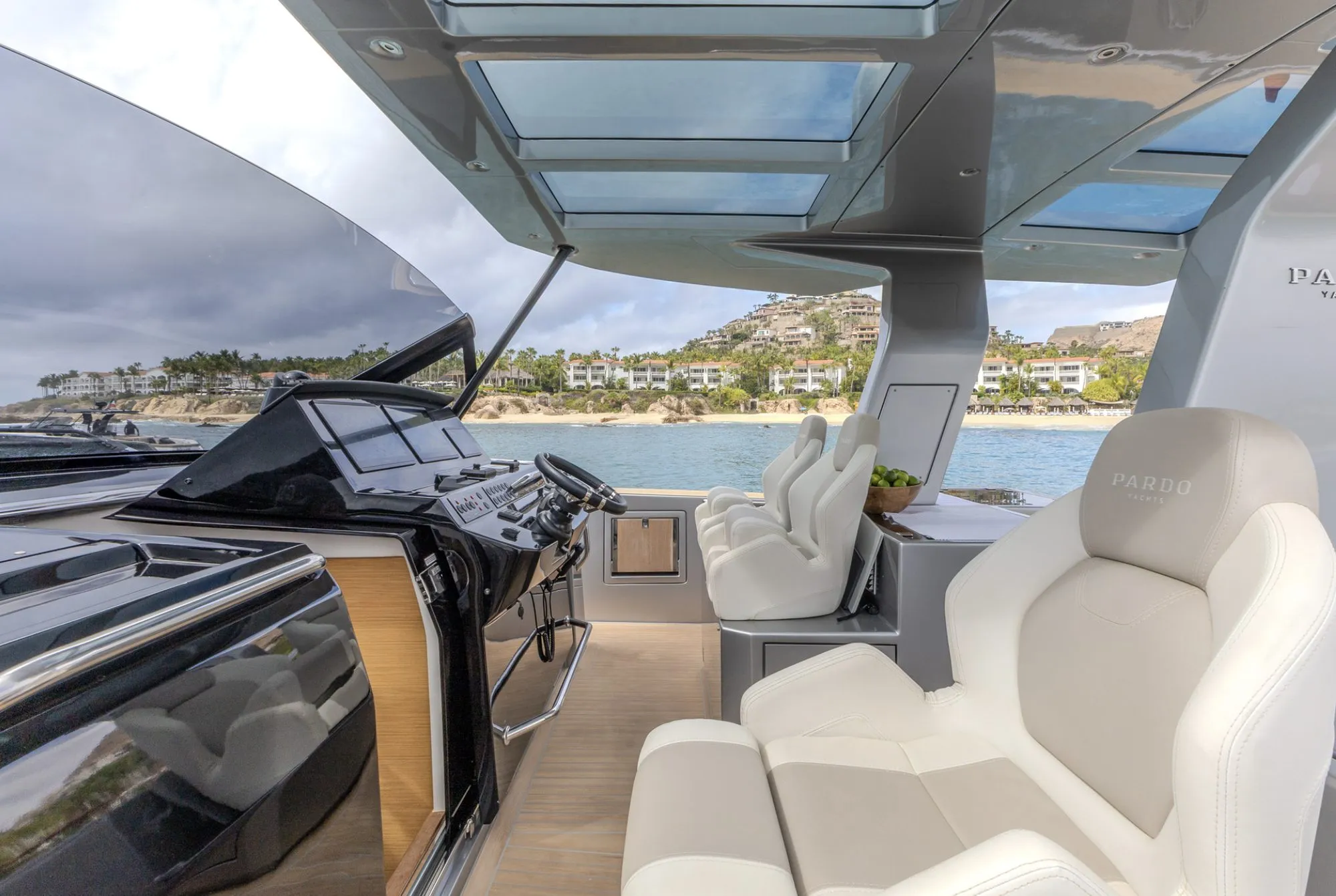 Helm and white leather seating under the hardtop of CIAO