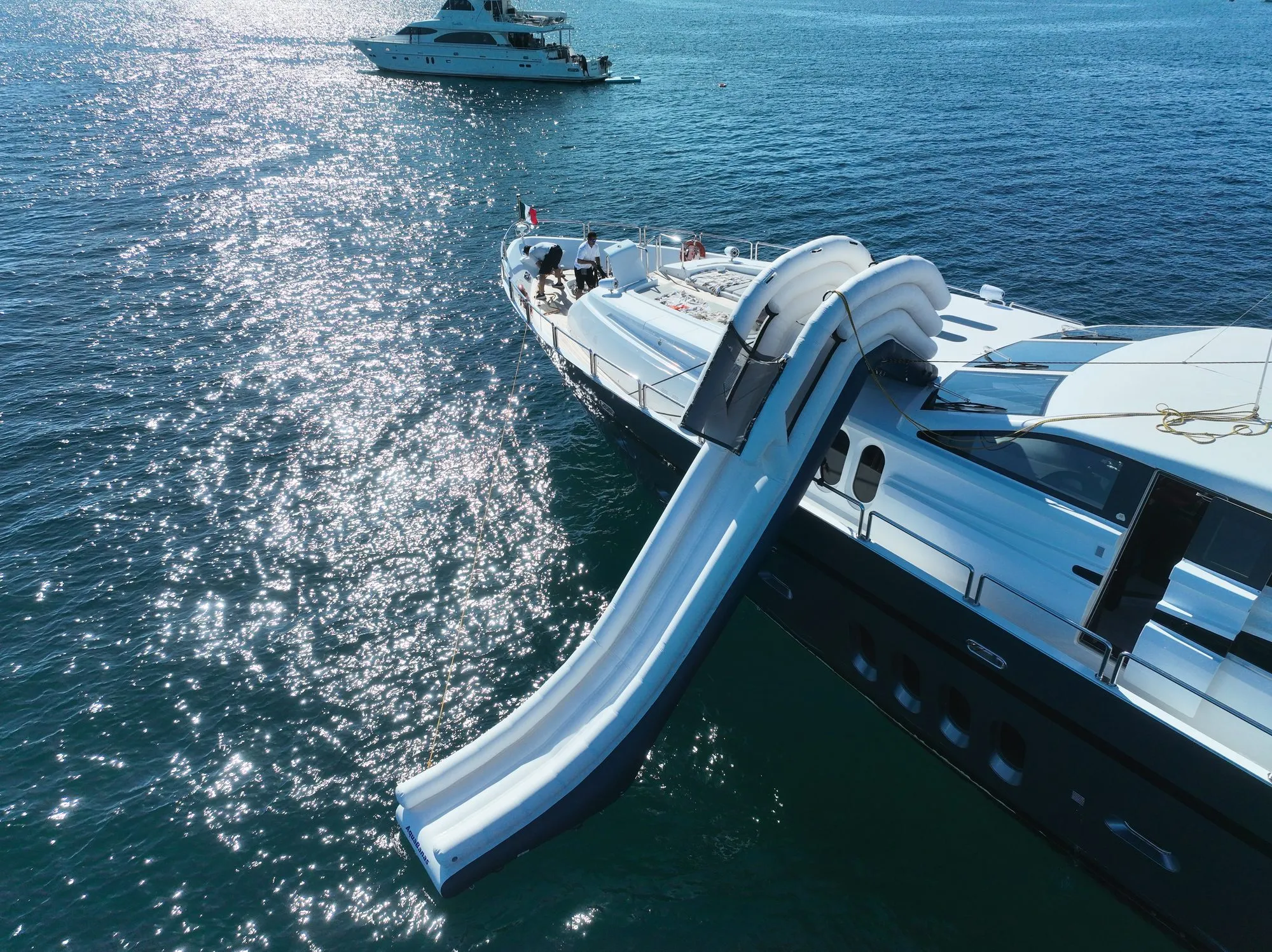 Overhead view of the inflatable waterslide on GO reaching the water