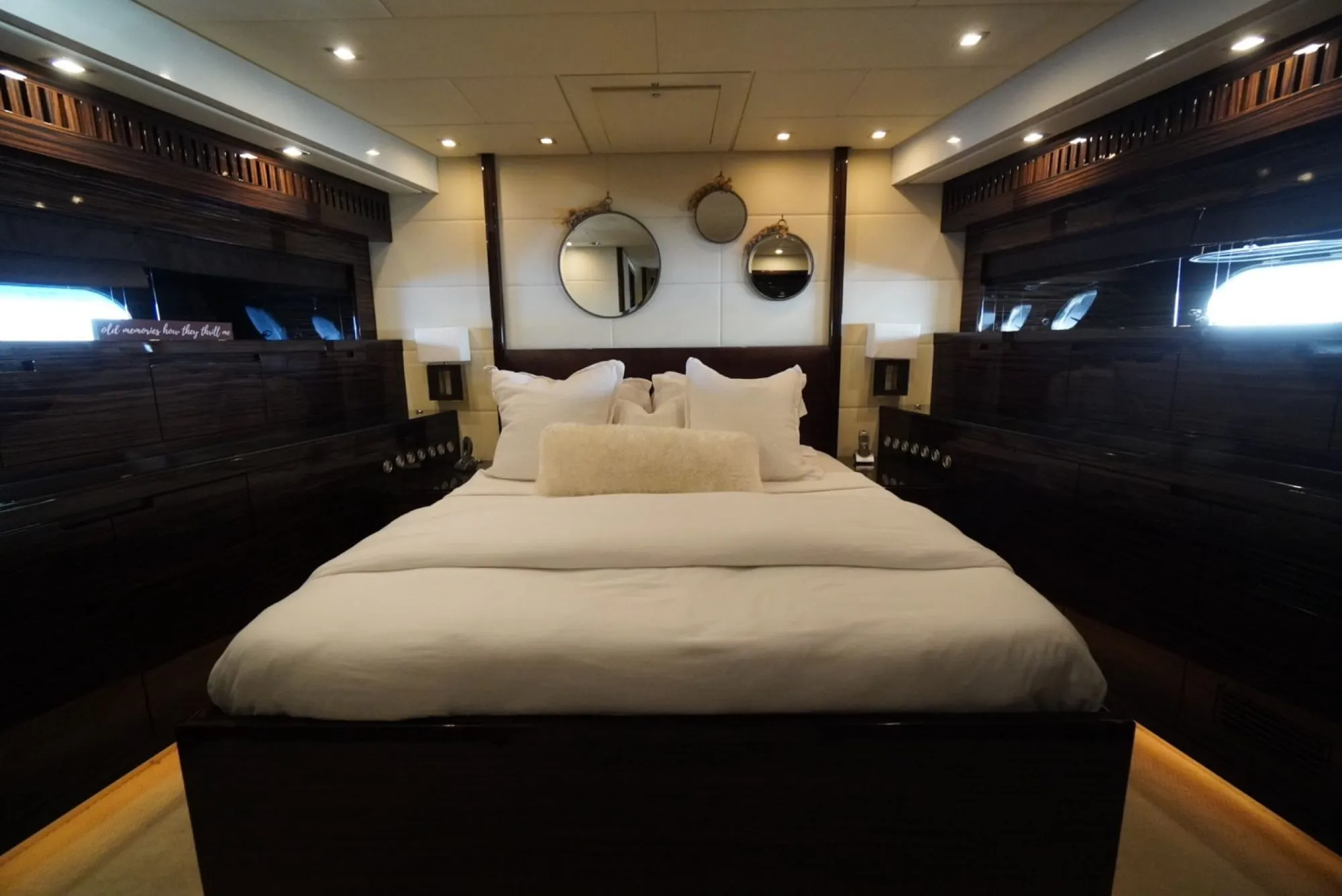 VIP cabin aboard GO with queen bed and mirrored dressers