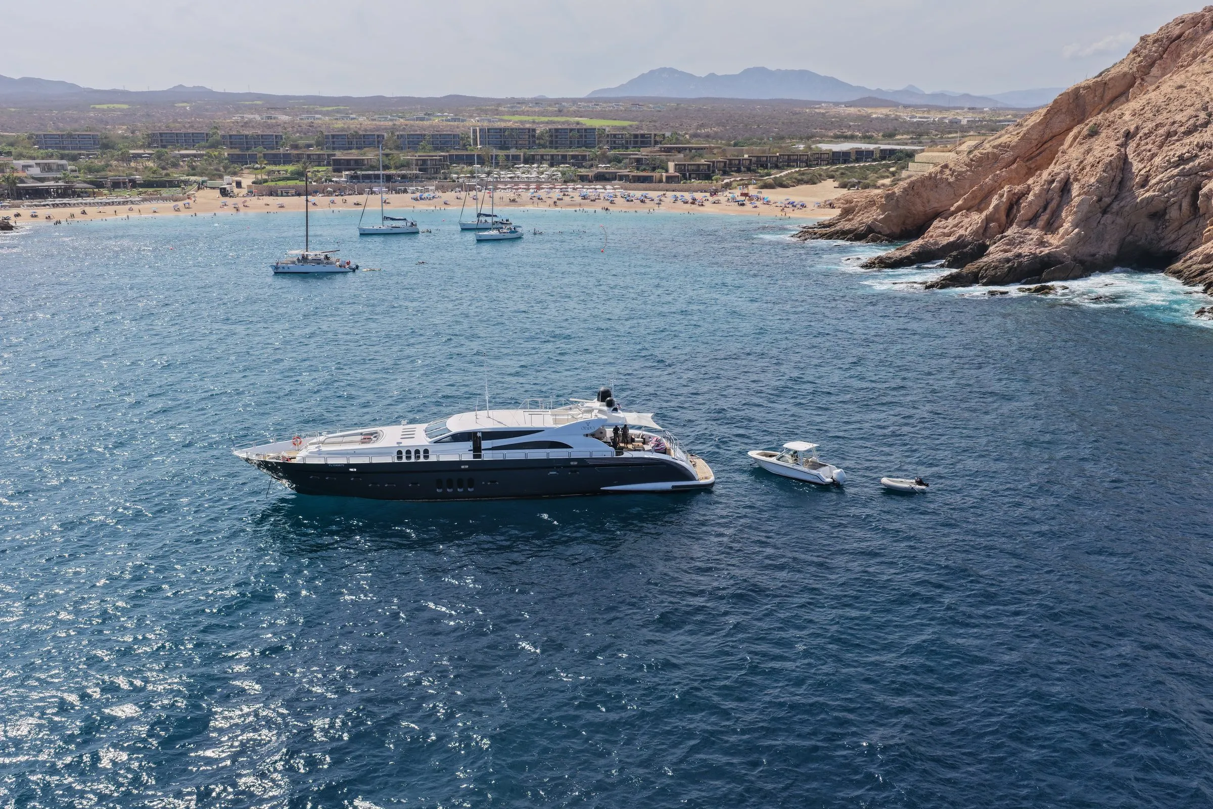 GO the Leopard 112 at anchor off a Los Cabos beach, aerial view