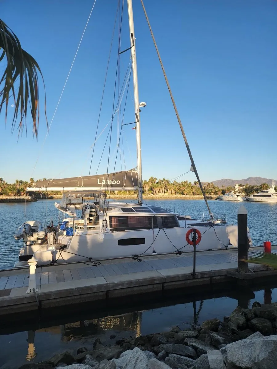 Lambo, a sailing catamaran, alongside the dock at Marina Puerto Los Cabos