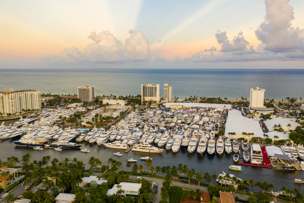 Superyachts fill the Fort Lauderdale harbor as the sun goes down.