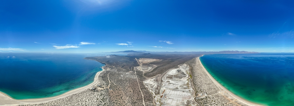 A drove view of Punta Arena with turquoise water on either side.