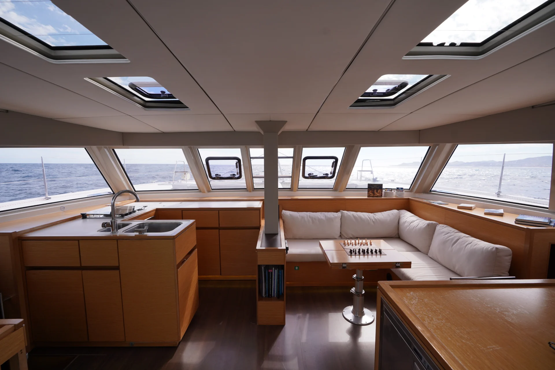 The yacht salon of the sailing catamaran Telemachus.
